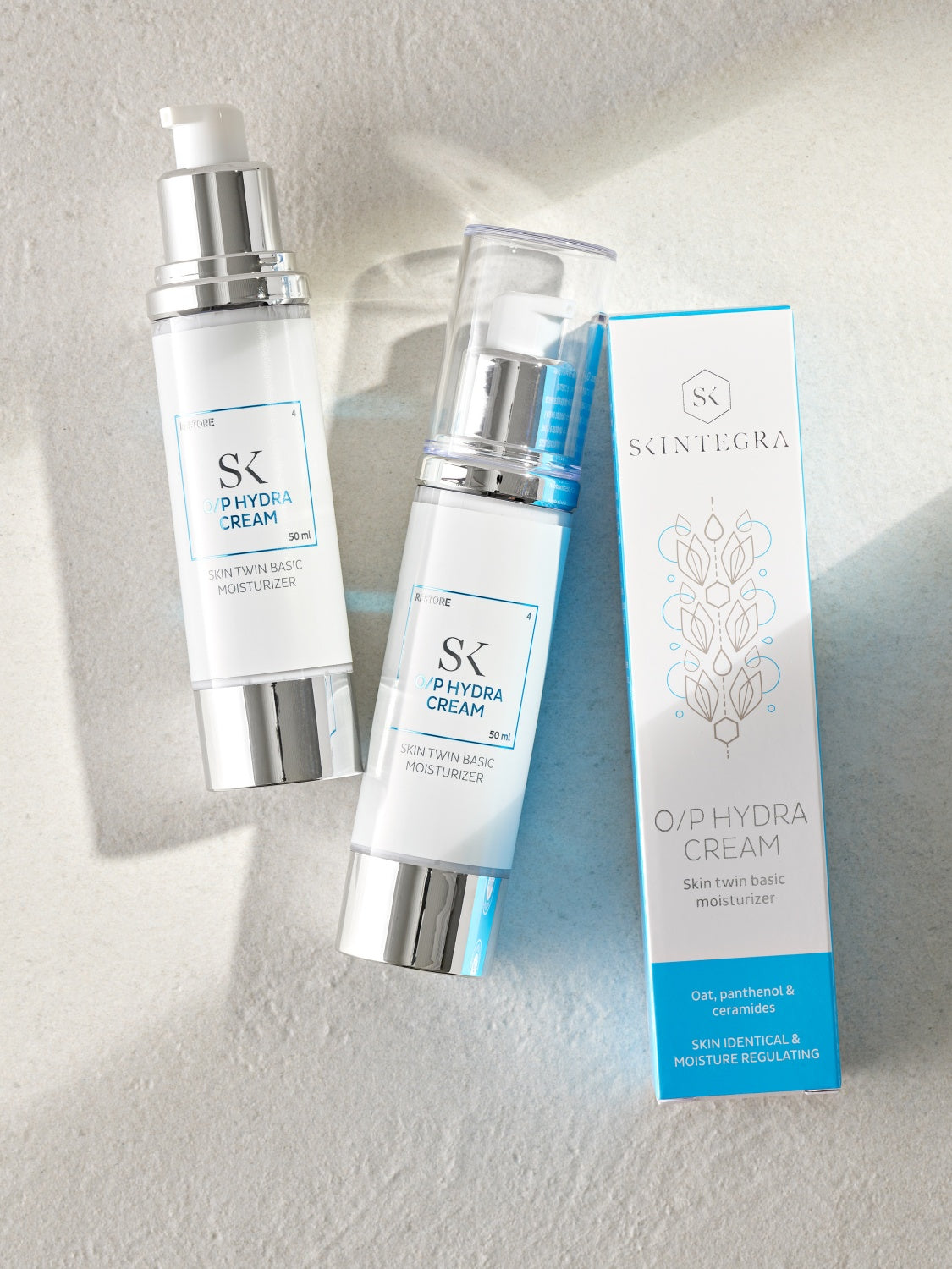 Skintegra O/P Hydra krema na bazi zobi, pantenola i ceramida u bočici i kutijici