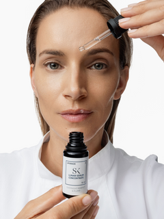 Skintegra Lunar serum concentrate s peptidima i probiotičkim fermentima u bočici sa ženom